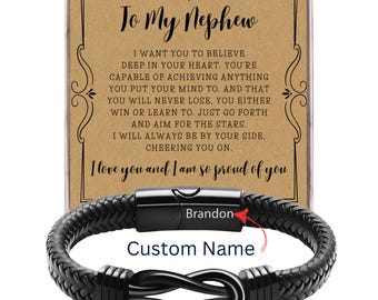 May include: Black braided leather bracelet with a stainless steel clasp. The bracelet features a knot design and the text "Custom Name". A card behind the bracelet reads "To My Nephew" and a message of encouragement.