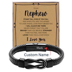 May include: A black braided leather bracelet with a stainless steel clasp. The bracelet is displayed with a card that reads "To My Nephew" and includes a personalized name. The card has a message of love and support.