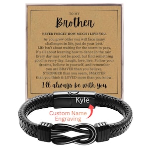 May include: A black braided leather bracelet with a magnetic clasp, personalized with the name "Kyle." The bracelet is presented with a card that reads "To My Brother" and a heartfelt message. The words "Custom Name Engraving" are also visible.