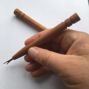 Very Practical Seam Ripper. Wood Turned Mahogany Handle. Sharp and Pointed Edge of the Ripper. Hole for hanging if wanted. Sewing. DIY.