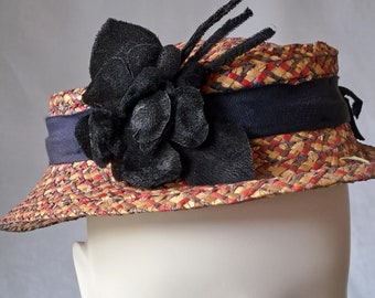 Hat trim or millinery flower from the 1960-70's. Hand made in synthetic Velvet. Sew on or use safety pin. Probably Swedish.