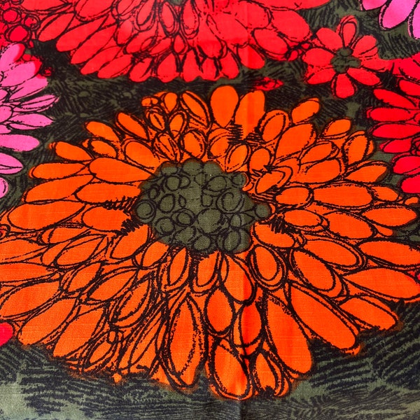 Scandinavian style vintage cotton fabric with printed pattern. Big flowers in red, pink and orange on oliv green bottom. Probably 1960-70's.