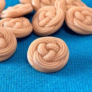 12 Opaque Beige Glass Buttons. Small Buttons. Self Shank. Medium Buttons. Knot Pattern. Glass Buttons. Never Used Buttons.