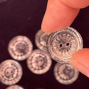 8 Clear Glass Buttons. Round Small Buttons. 2 Hole Buttons. 1950&#39;s. Pattern Underneath. Striped Pattern. Clothing. DIY. Sewing.