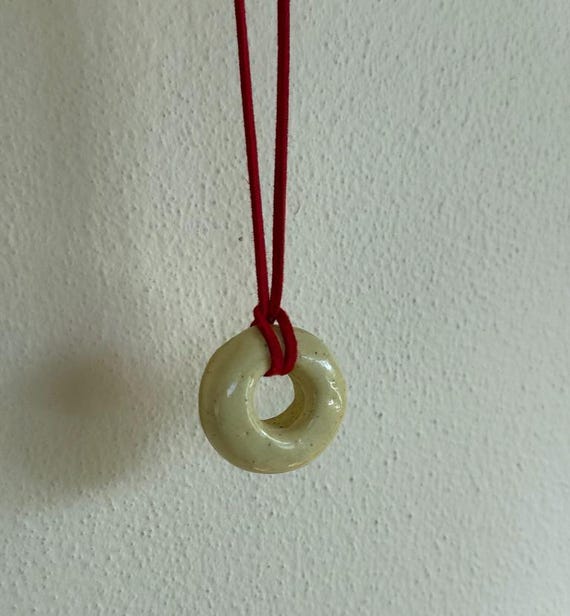 Ceramic pendant necklace with faux suede cord