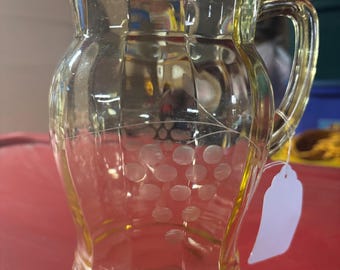 Yellow depression glass pitcher