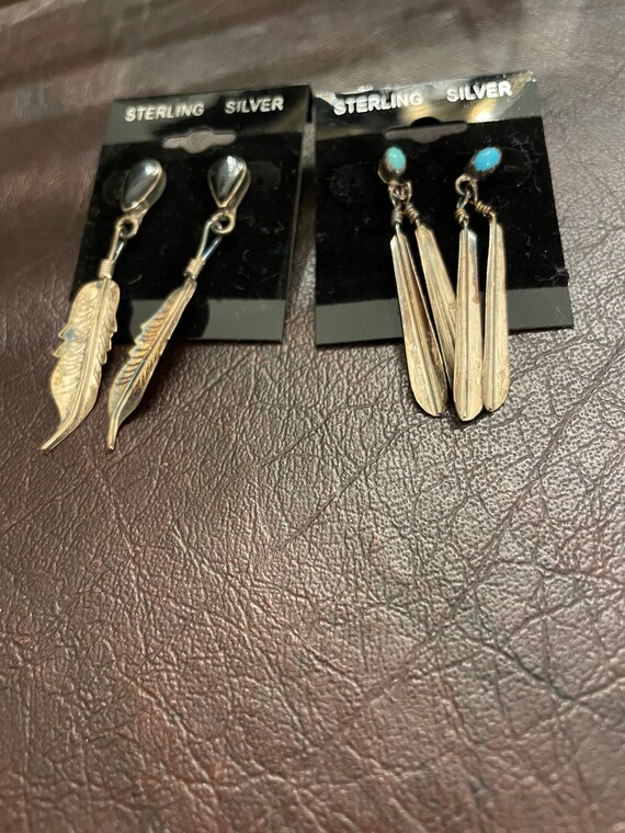 Set of feather sterling silver earrings