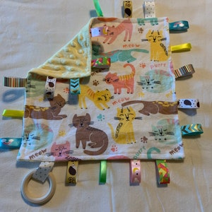 Etsy taggie blanket hotsell