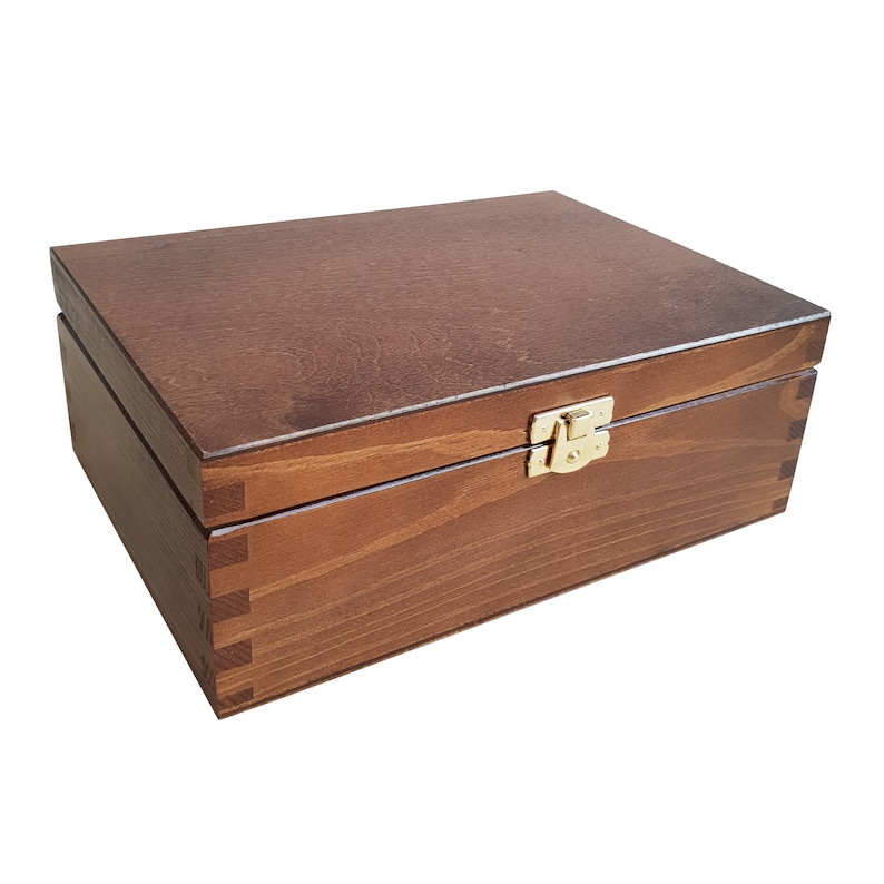 May include: A wooden box with a hinged lid and a brass latch. The box is stained a dark brown color and has a smooth finish.