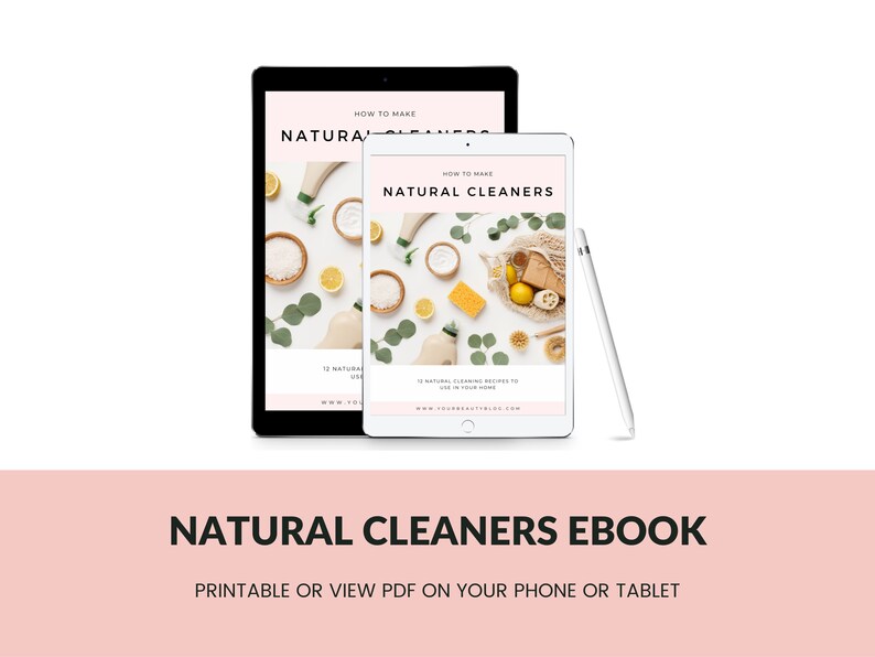 May include: Two tablets displaying an ebook titled "How to Make Natural Cleaners." The ebook cover features natural cleaning ingredients. A white stylus rests beside the tablets. The text "Natural Cleaners Ebook" is below the tablets.