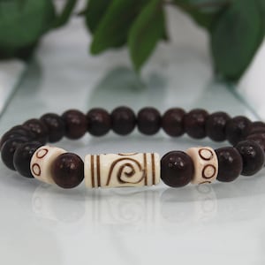 Carved Bone Tube Bead, Carved Tire Bone Bead, Rosewood Beads (10mm). Boho Style Bracelet, Stretch Cord. Handmade.