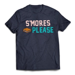 May include: A navy blue t-shirt with the text "S'mores Please" in white and teal lettering. A cartoon image of a s'more is to the left of the text.
