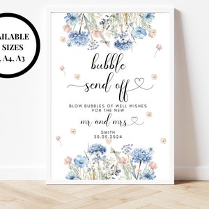 May include: A white sign with a floral design and the text "bubble send off". The sign also includes the text "Blow bubbles of well wishes for the new Mr. and Mrs. Smith 30.05.2024".