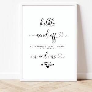 Puede incluir: Un cartel imprimible en blanco y negro que dice "bubble send off" con un s&iacute;mbolo de coraz&oacute;n. Tambi&eacute;n dice "Blow bubbles of well wishes for the new Mr. and Mrs. Smith 30.05.2024" con un s&iacute;mbolo de coraz&oacute;n.