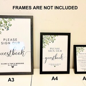 Puede incluir: Tres carteles de boda enmarcados con un dise&ntilde;o verde de hojas y el texto "Por favor, firme nuestro libro de visitas". Los carteles son de tama&ntilde;o A3, A4 y A5. Los marcos no est&aacute;n incluidos.