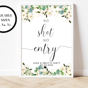 Puede incluir: Un letrero blanco enmarcado con el texto "NO shot NO entry" en elegante escritura negra, adornado con detalles florales. El letrero incluye los nombres "JACK & EMILY'S PARTY" y la fecha "29.04.2023". Disponible en tama&ntilde;os A5, A4 y A3.