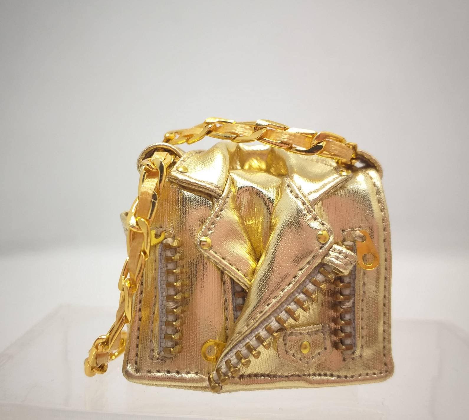 Gold store moschino bag
