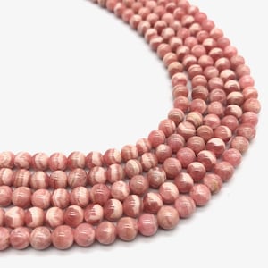 Natural Rhodochrosite Round Beads: AAA Crystal Strand, 5.8mm 15 Inch