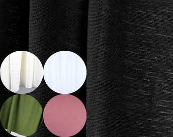 May include: Four fabric swatches in different colours and textures. The swatches are white, green, pink, and black. The black swatch has a subtle shimmer.