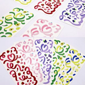 May include: Six sheets of colorful stickers with different designs. Each sheet features a different fruit or berry theme: strawberries, peaches, blueberries, lemons, avocados, and a mix of all fruits. The stickers are perfect for adding a touch of whimsy to journals, planners, and other craft projects.