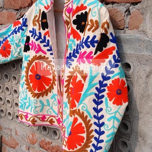 Vest Ethnique Femme
Suzani Jacket
Suzani
Embroidery Jacket
Jacket
Vintage Jacket
Woven Jacket Japanese
Womens Colorful Jacket
Embroidered Cardigan Women
Embroidered Bomber Jacket
Coats and Jackets
Suzani Bomber Jacket
Handmade Suzani
Guatemalan Blaze
