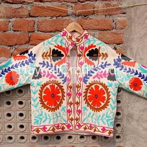 Vest Ethnique Femme
Suzani Jacket
Suzani
Embroidery Jacket
Jacket
Vintage Jacket
Woven Jacket Japanese
Womens Colorful Jacket
Embroidered Cardigan Women
Embroidered Bomber Jacket
Coats and Jackets
Suzani Bomber Jacket
Handmade Suzani
Guatemalan Blaze