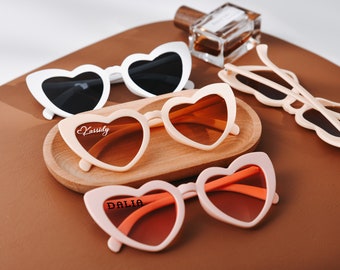 Stylish bridal sunglasses, unique bridesmaid gifts, bachelorette party favors, custom heart-shaped glasses, stunning wedding accessories!