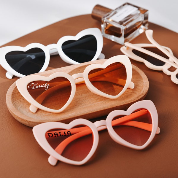 Stylish bridal sunglasses, unique bridesmaid gifts, bachelorette party favors, custom heart-shaped glasses, stunning wedding accessories!