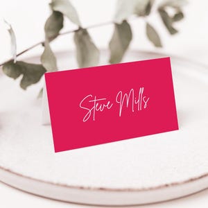 Tarjeta de lugar rosa brillante, tarjetas de nombre naranjas, tarjetas de nombre de colores llamativos