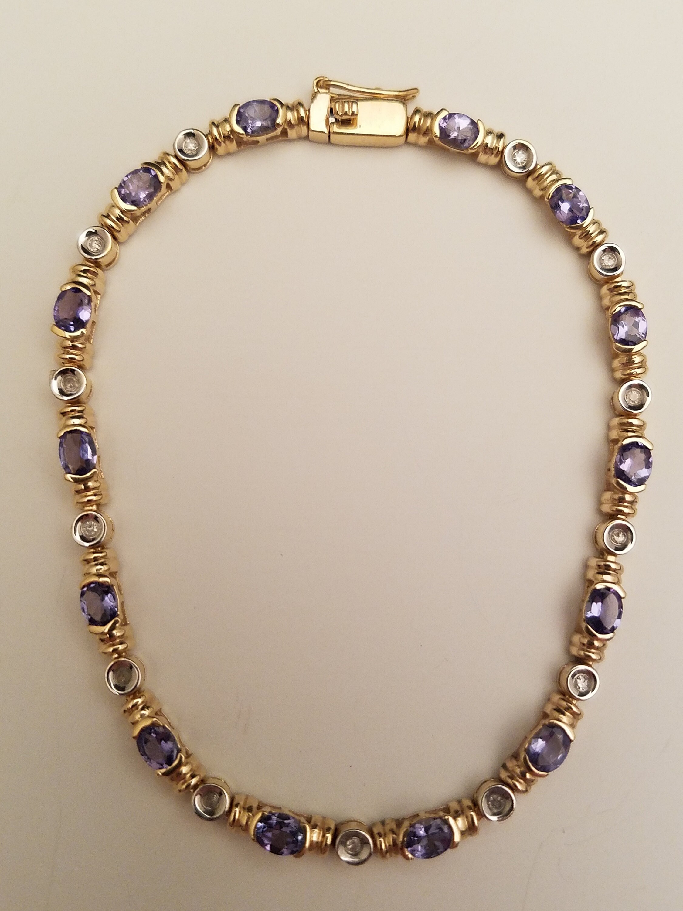 Tanzanite Diamond Bracelet mounted in 14k gold. Etsy