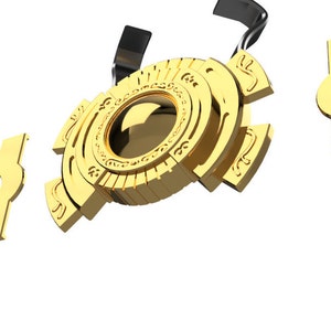 May include: A gold-colored metal puzzle with intricate details. The puzzle is made up of several interlocking pieces, and it appears to be a complex and challenging design.