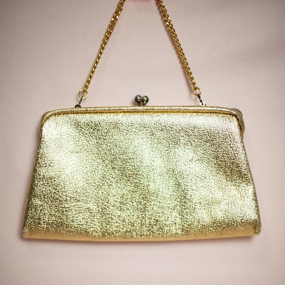 Trapezoid Metallic Embossed Clutch