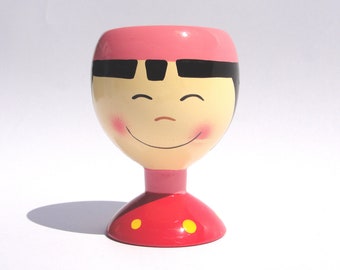 Egg cup Asian girl