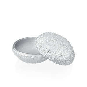May include: A silver, round, decorative box with a textured surface resembling a sea urchin. The lid is open and the box is empty.