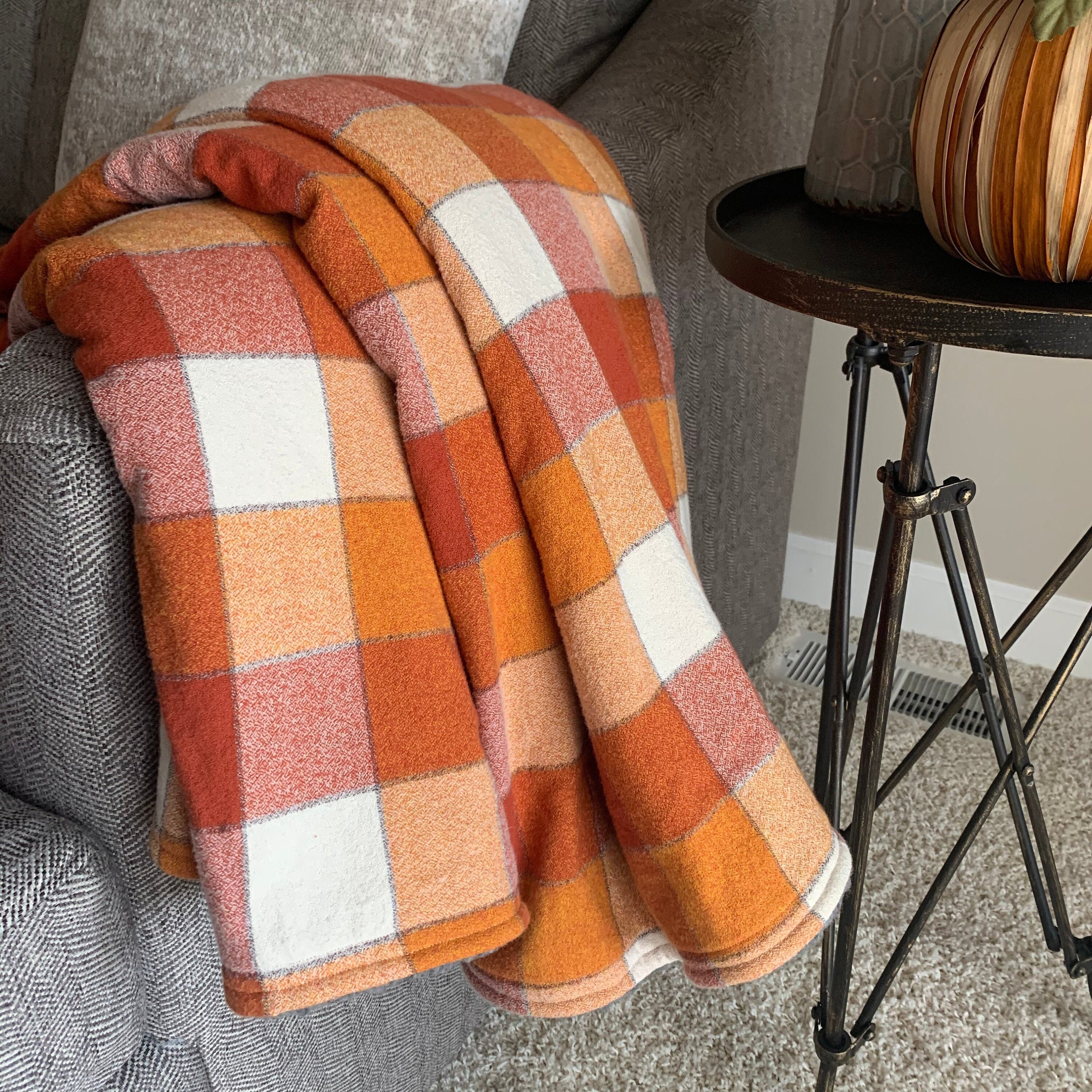 Orange plaid throw sales
