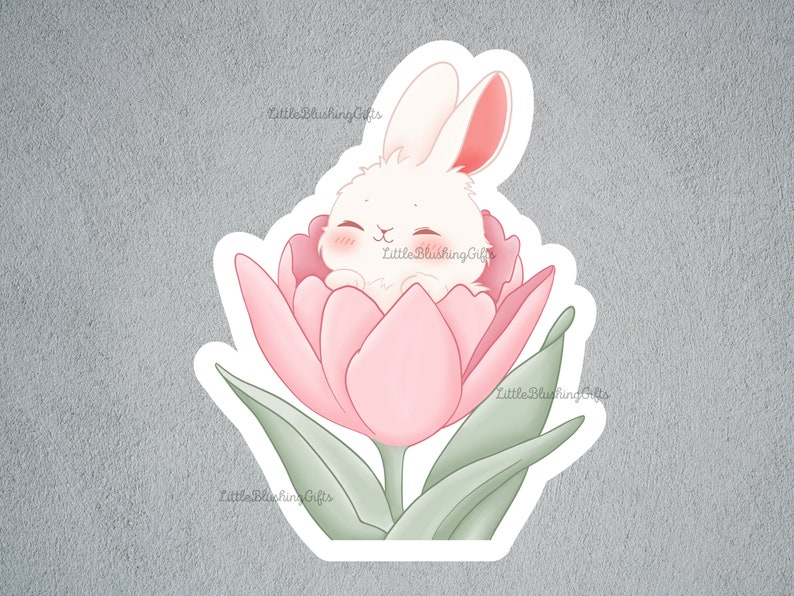 May include: A white bunny with pink ears is nestled inside a pink tulip. The tulip has green leaves and a stem.