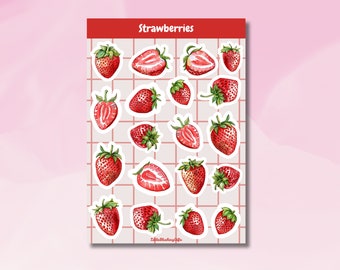 May include: A sheet of stickers featuring 18 red strawberries in various positions, including whole strawberries and halved strawberries. The stickers are on a white background with a grid pattern.