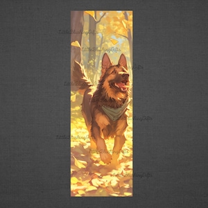 May include: A brown and tan German Shepherd dog with a blue bandana runs through a field of yellow leaves. The dog is looking up and smiling.