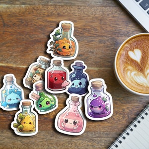 May include: Nine colourful glass bottles with cute cartoon characters inside. The bottles are on a wooden surface and have cork tops.