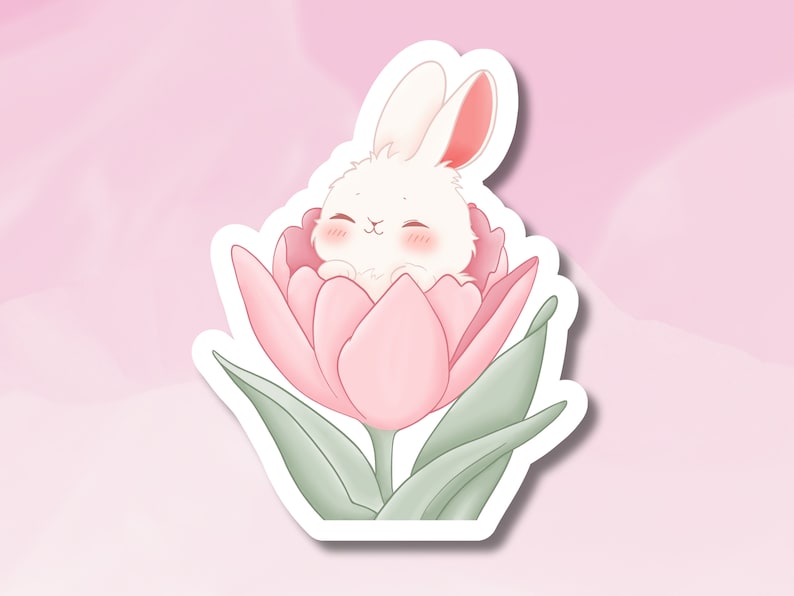 May include: A white bunny with pink cheeks is nestled inside a pink tulip. The tulip has green leaves and a stem.