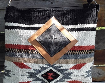 Saddle blanket, leather diamond cross purse.