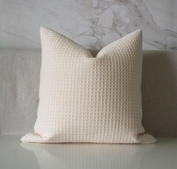 cream textured throw pillows