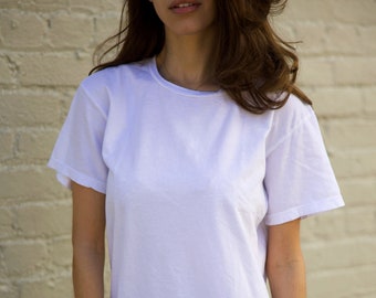 Our Classic White Unisex T-Shirt is made from an extremely soft, lightweight jersey out of 100% cotton fibers, Made In Los Angeles.