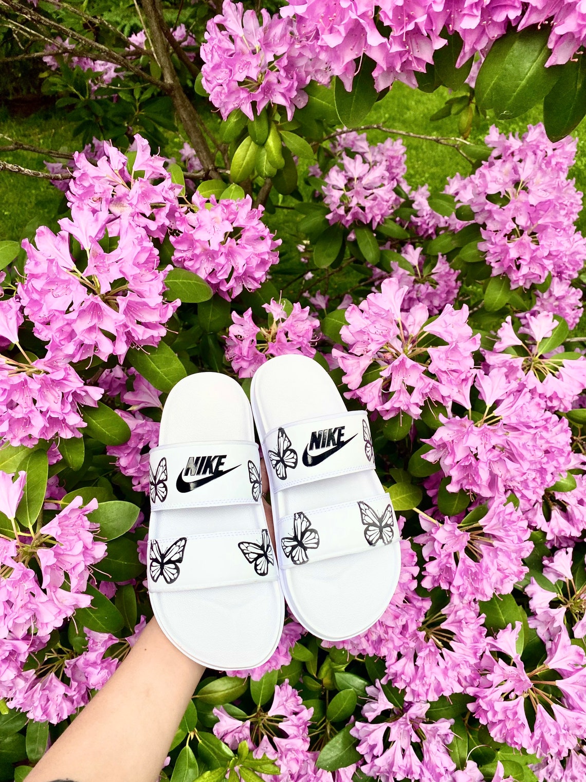 nike slides with butterflies
