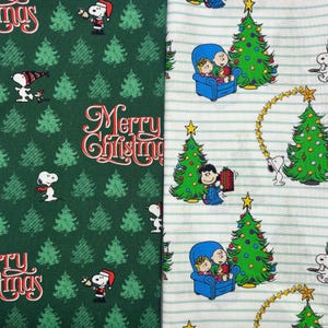 Snoopy Christmas Fabrics 100% cotton. Also sold by the half yard or full yards.