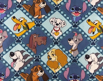 Disney Dogs Fabric 100% cotton. Also sold by the half yard or full yards.