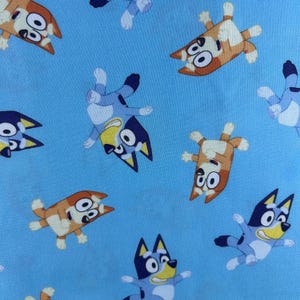 Bluey and Bingo Fabric 100% cotton. Also sold by the half yard or full yards.