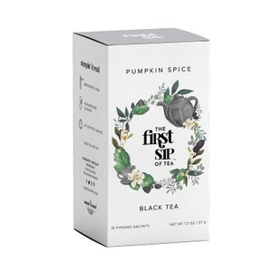 May include: White box of "Pumpkin Spice" black tea. The box features a floral wreath design with a teapot illustration. Text on the box includes "The First Sip of Tea" and instructions for brewing. Contains 16 pyramid sachets, net weight 1.3 oz.