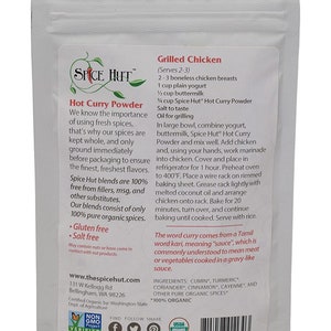 May include: A white pouch with a red and black logo for Spice Hut Hot Curry Powder. The pouch has a recipe for grilled chicken using the curry powder. The recipe includes ingredients like boneless chicken breasts, plain yogurt, buttermilk, and coconut oil. The pouch also includes the text "Gluten free" and "Salt free".
