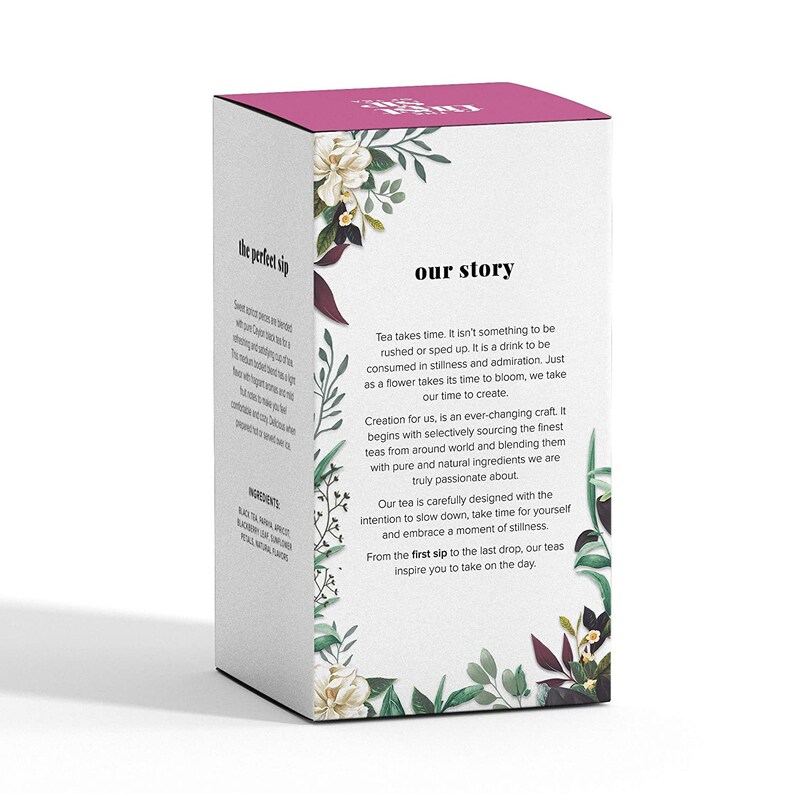 May include: A pink and white box with a floral design. The box has text that reads "the perfect sip" and "our story". The text describes the tea as a drink to be savored and enjoyed in stillness. The box also mentions that the tea is made with pure and natural ingredients.